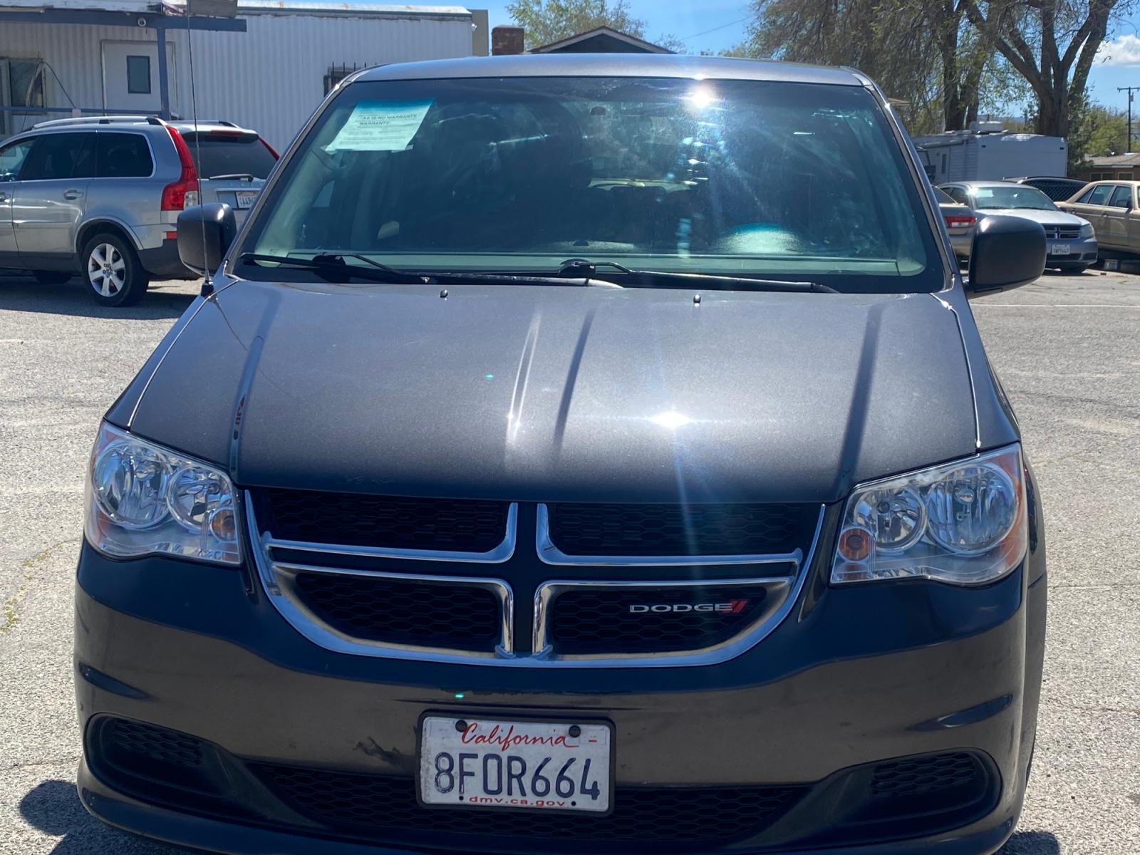 2016 /BLK Dodge Grand Caravan (2C4RDGBG8GR) with an V6, FLEX FUEL, 3.6 LITER engine, AUTOMATIC 6-SPD transmission, located at 44356 Date Ave., Lancaster, CA, 93534, (661) 945-6555, 34.688919, -118.139374 - Photo #0